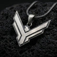 Load image into Gallery viewer, Oxidized sterling silver House Atreides pendant on black volcanic rock, featuring the angular hawk emblem, layered geometric edges, and bold Dune inspired design.