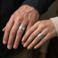 Load image into Gallery viewer,
Polished silver Targaryen dragon ring worn on the finger, lifestyle shot highlighting the bright silver finish, engraved band sides, and detailed dragon emblem.