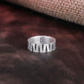 Load image into Gallery viewer, Overhead shot of the silver band ring, showcasing its minimalist style
