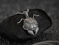 Load image into Gallery viewer, Close-up of silver honeybee face charm, nature-inspired.