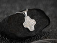 Bild in Galerie-Betrachter laden, Sterling silver tree-inspired cross pendant, displayed on dark stone.
