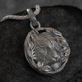 Load image into Gallery viewer, Regal lion head pendant with laurel wreath,