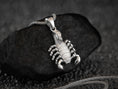 Load image into Gallery viewer, Scorpio zodiac sign pendant, detailed silver craftsmanship.