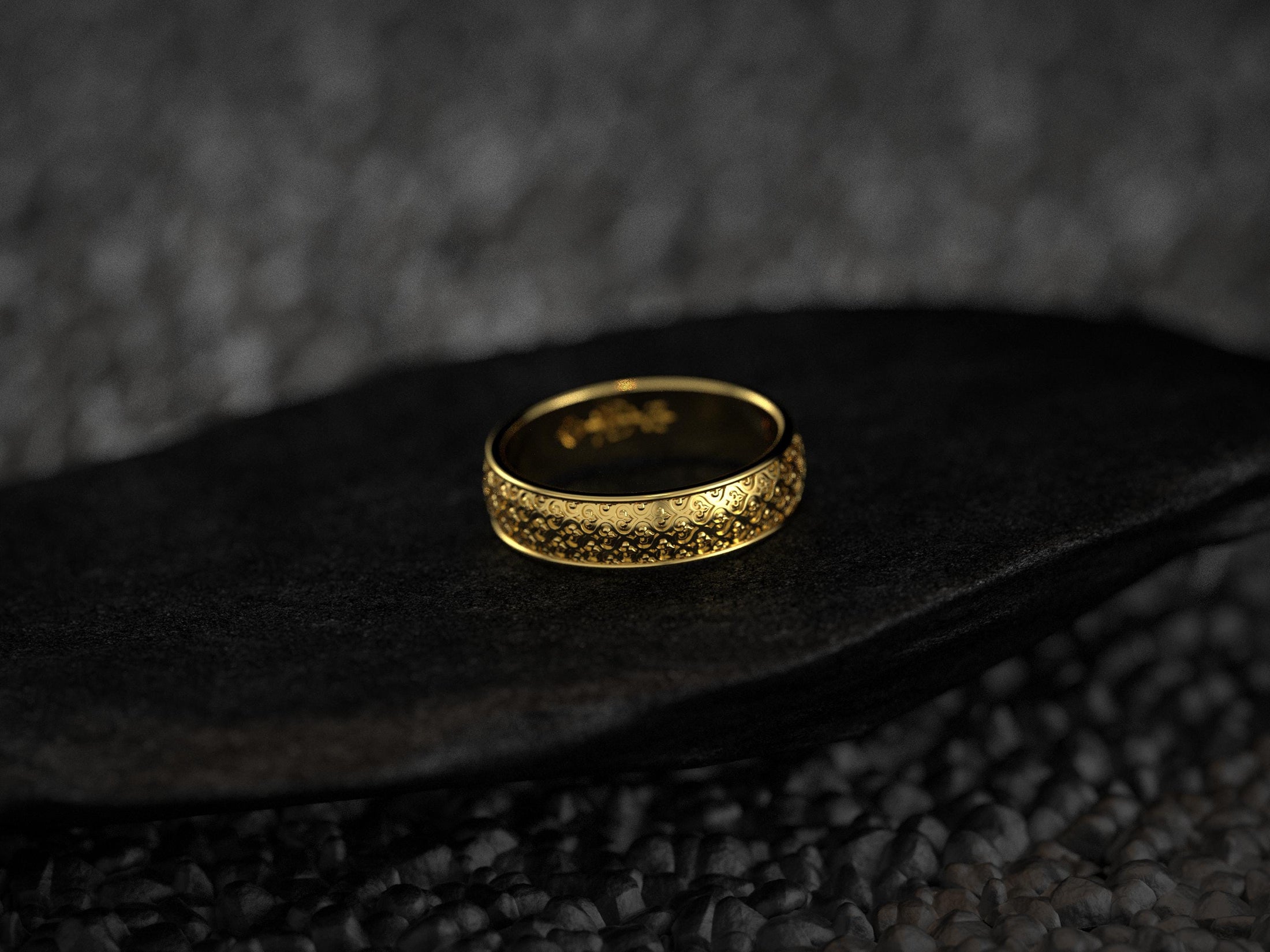 Gold plated floral wedding band with engraved detailing