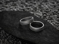 Load image into Gallery viewer, Matching oxidized floral wedding bands on dark background