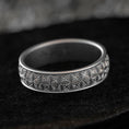 Load image into Gallery viewer, Oxidized silver starburst wedding band with engraved detail