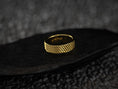 Load image into Gallery viewer, Modern yellow gold ring with woven design on black stone