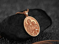 Bild in Galerie-Betrachter laden, Rose gold plated Saint Joseph and Jesus oval pendant necklace with floral background,