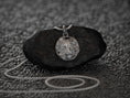 Load image into Gallery viewer, Lion face charm in classical laurel setting,