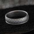 Load image into Gallery viewer, Oxidized silver wedding band with braided floral motif on black stone