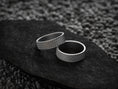 Load image into Gallery viewer, Pair of dark silver textured wedding bands with comfort fit