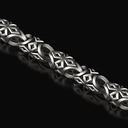 Close-up of gothic star chain in oxidized silver