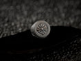 Load image into Gallery viewer, Bold round crest ring showing intricate side textures in silver,