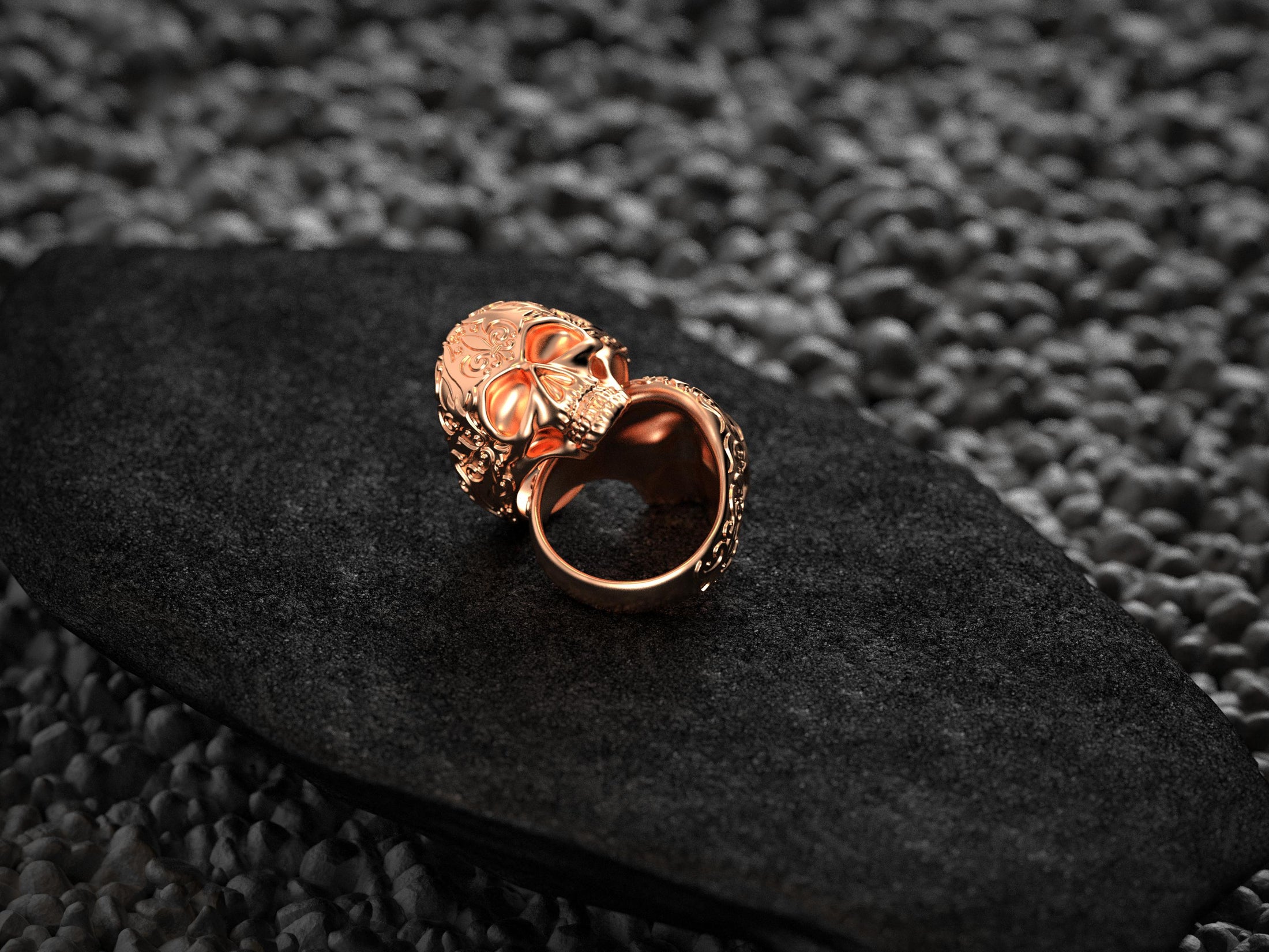 Rear view of rose gold skull ring interior gold finish.
