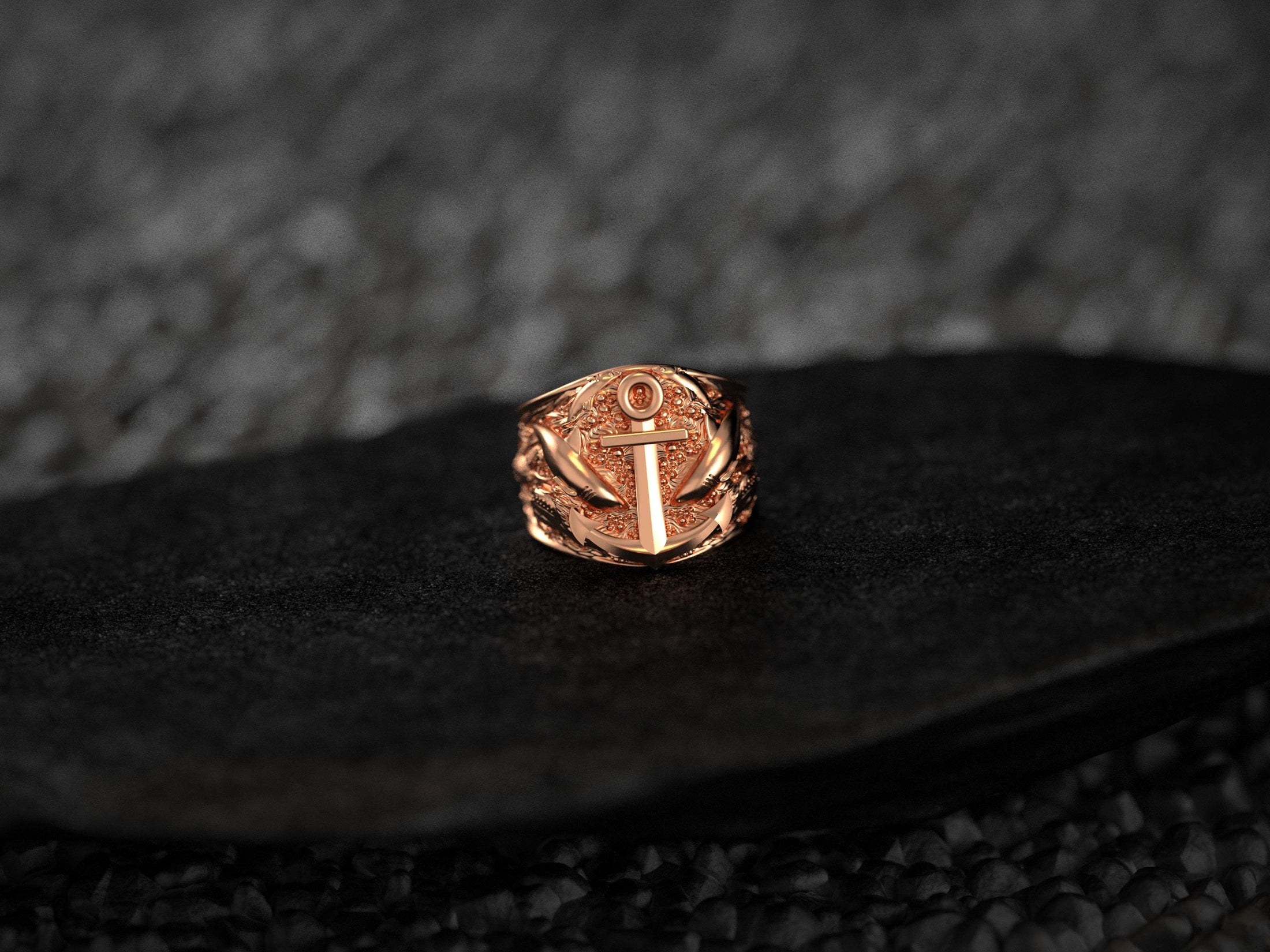 Front view of rose-gold anchor & sharks signet ring.