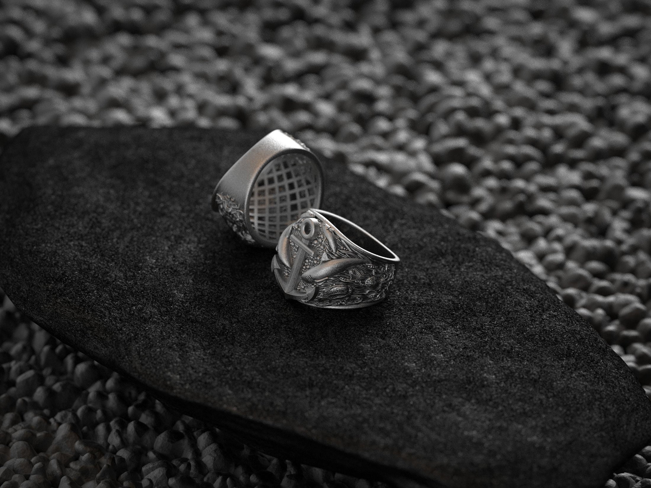 Side profile of silver ring band with leaping shark motifs.