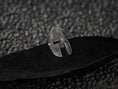 Load image into Gallery viewer, Three-quarter angle of the silver ring highlighting the depth of the helmet’s eye-slits and curved crest.
