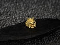 Bild in Galerie-Betrachter laden, Gold plated Wolf and Skull Ring highlighting tribal symbolism