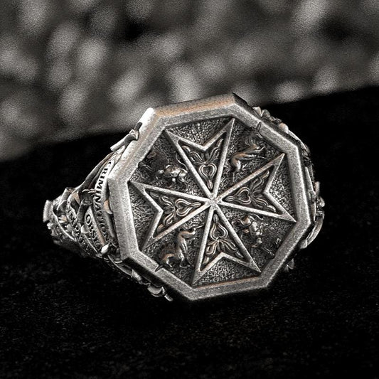 Oxidized Finish Maltese Cross Signet Ring on black background