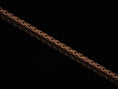 Load image into Gallery viewer, Rose gold-plated Christian link chain on dark surface
