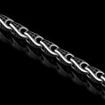 Load image into Gallery viewer, Oxidized silver cross chain with engraved link design on black background