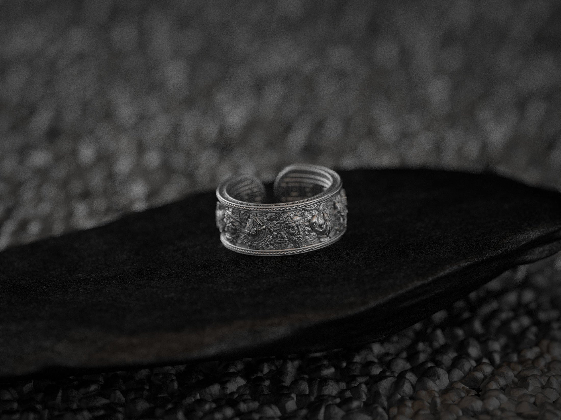 Ancient mythology cuff band with sculpted figures and deities