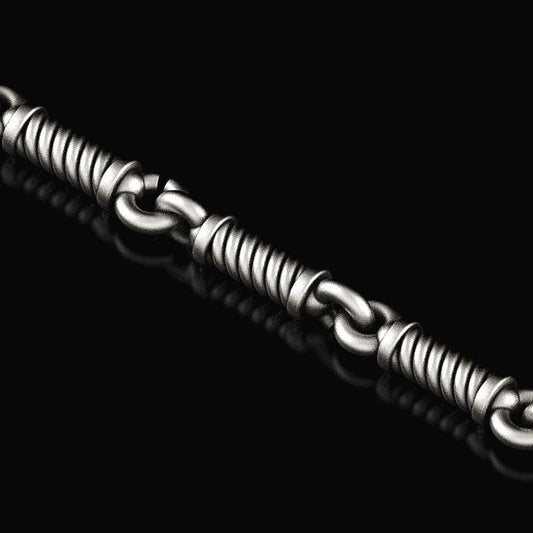 Close-up view of the twisted wire chain in oxidized finish