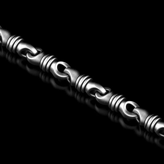 Close-up of ridged barrel link chain