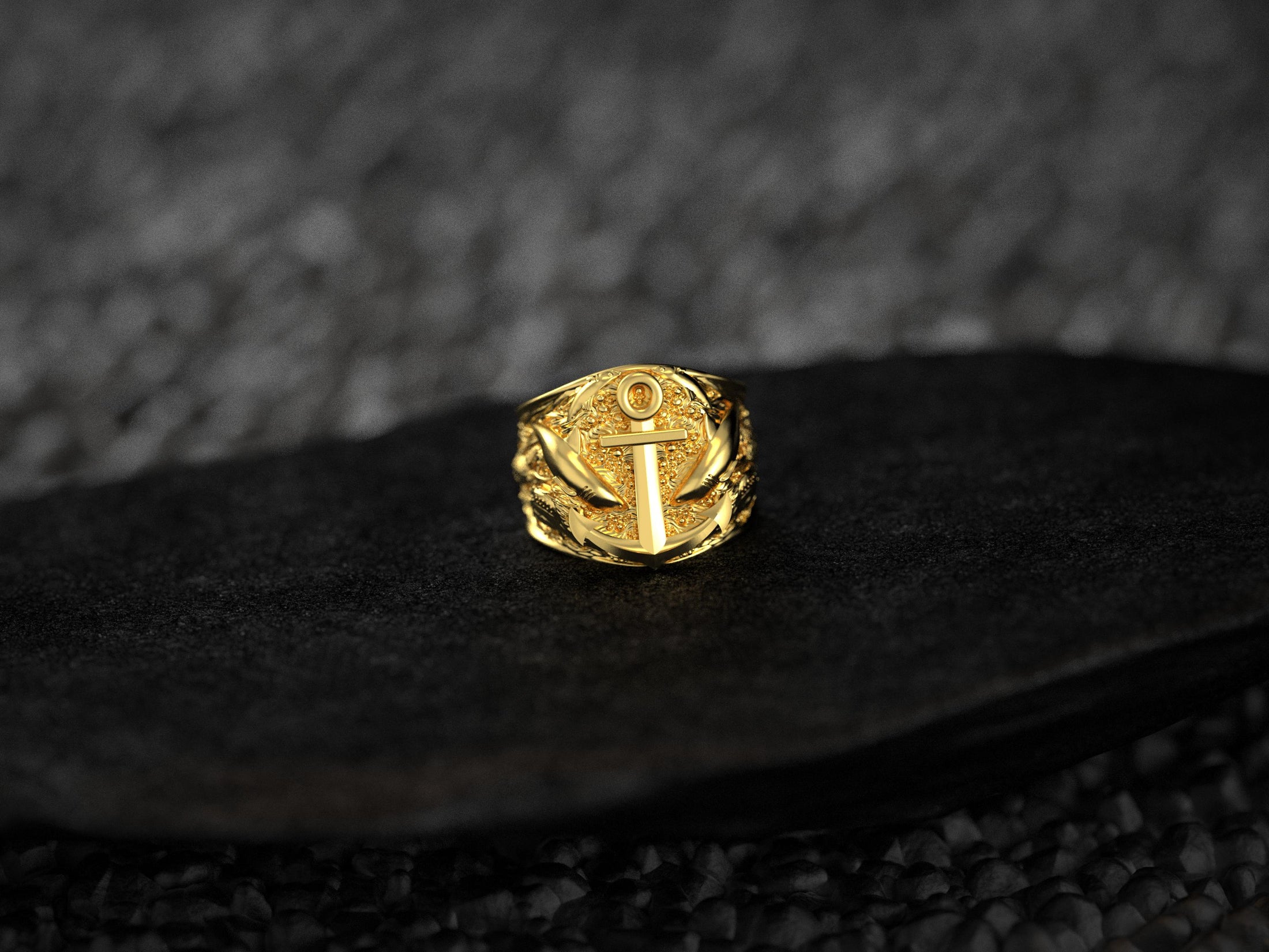 Front view of gold-plated anchor signet ring variant.