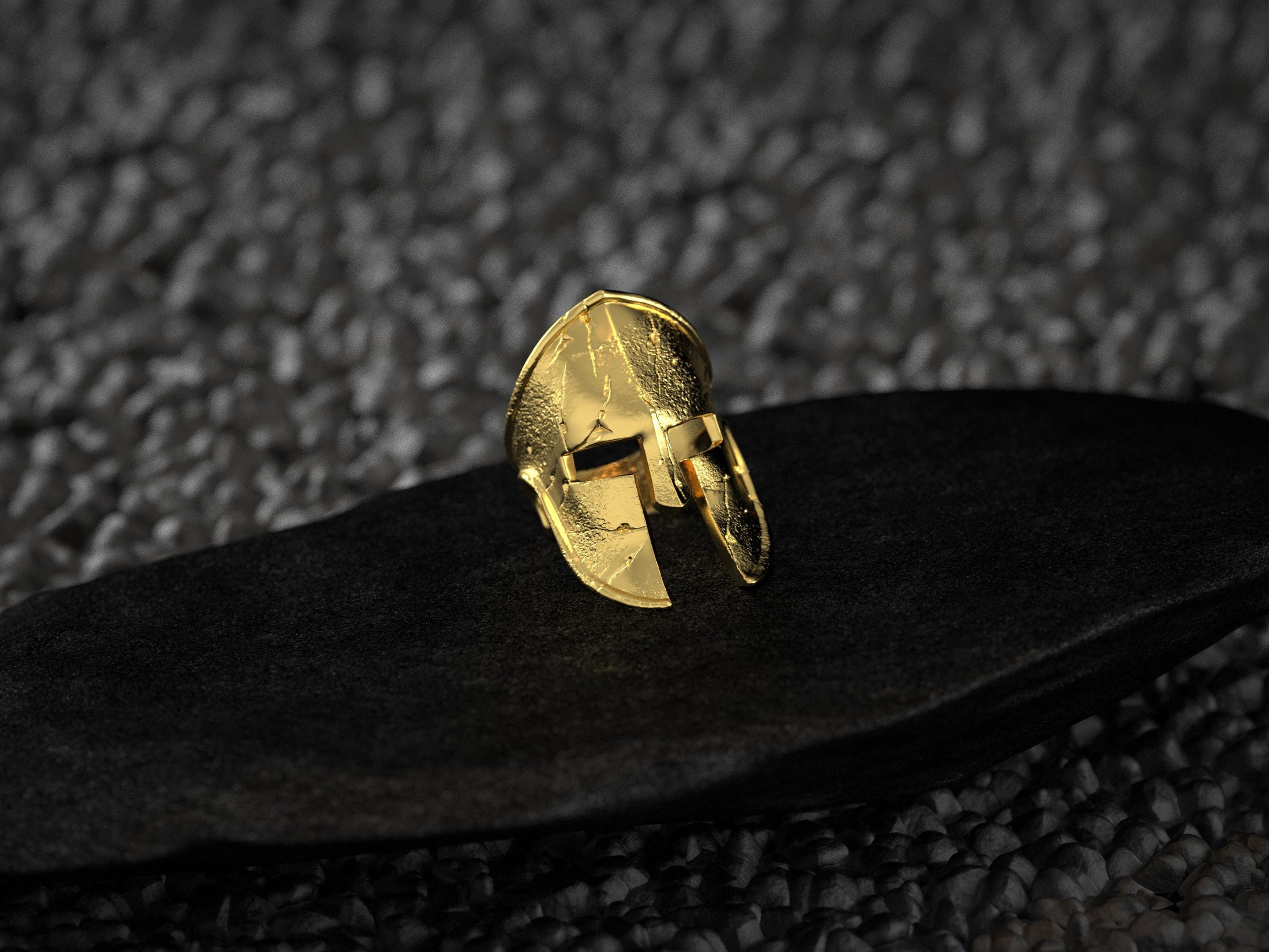 Front view of the same helmet ring plated in rich 18K yellow gold with a warm gleam.