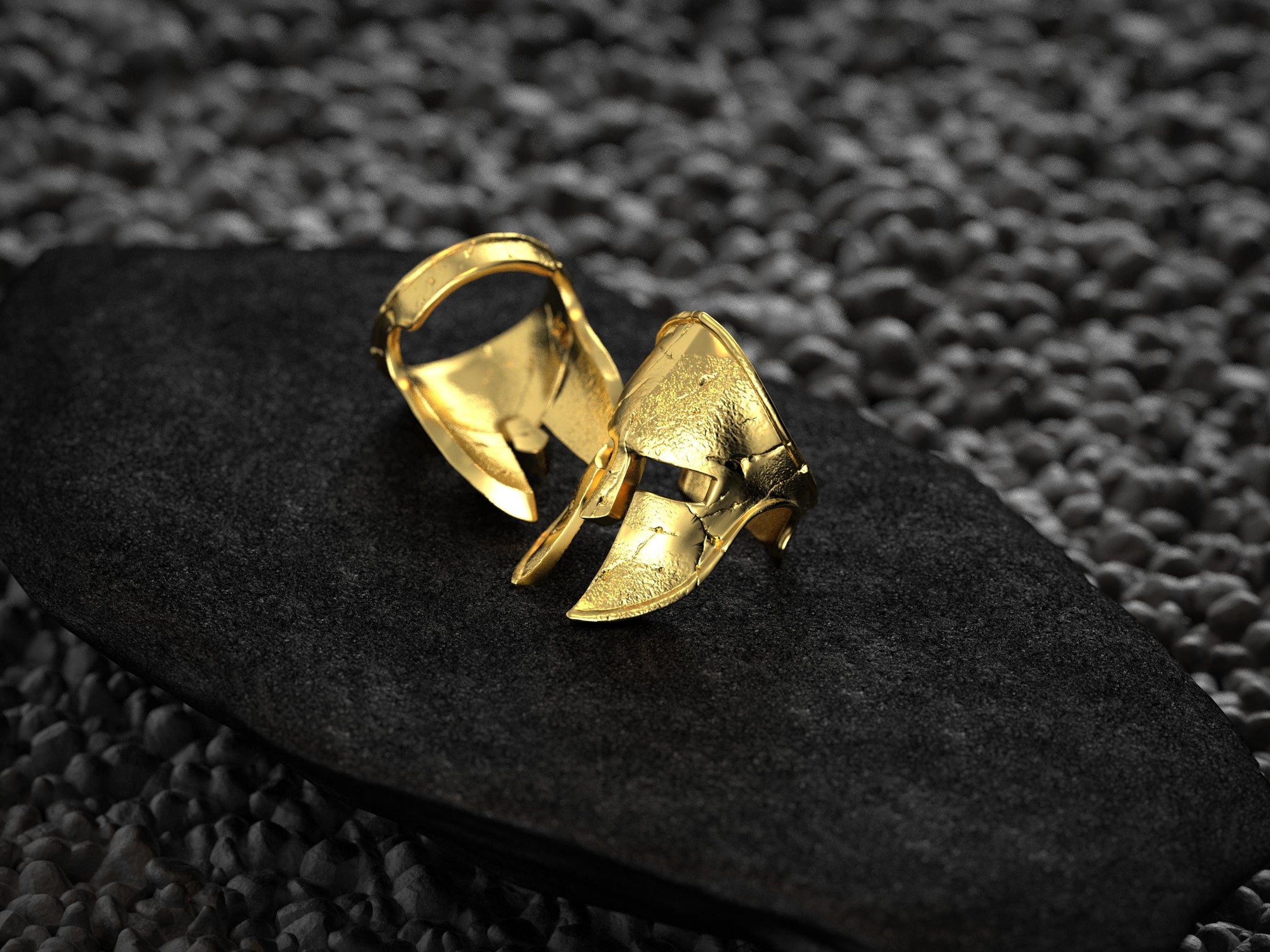 Angled shot of the gold-plated ring showing its sculpted profile and polished band.