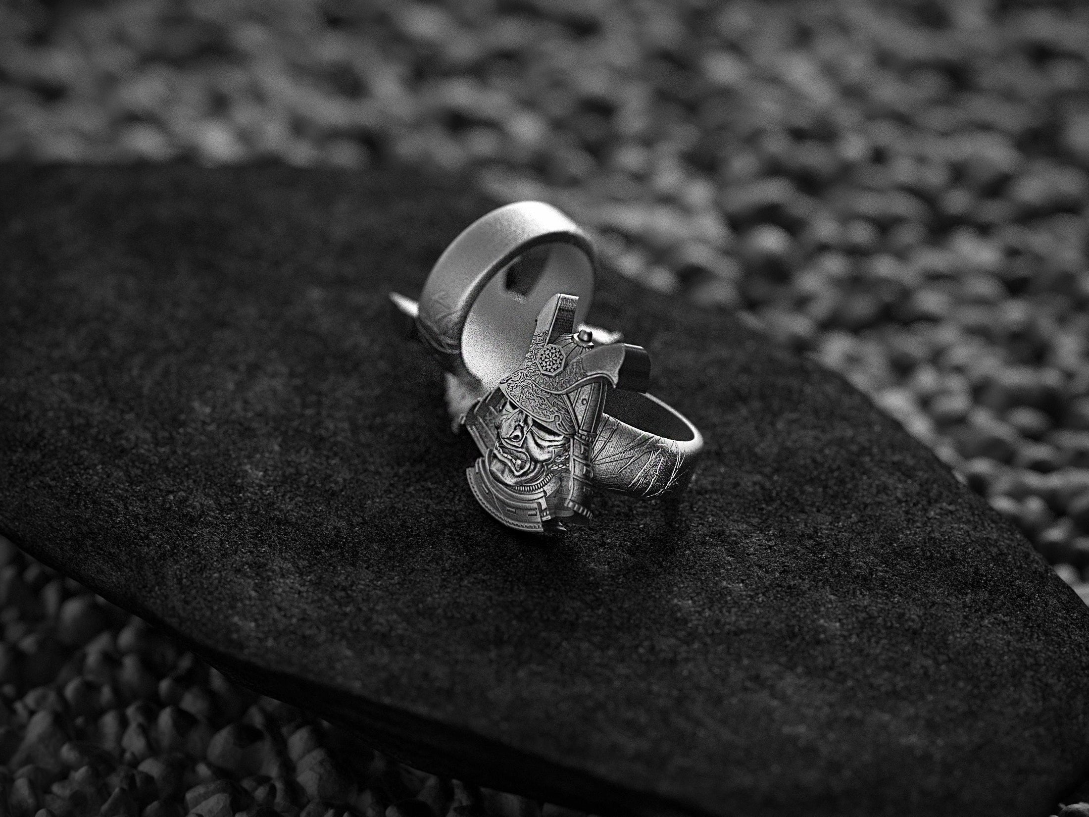 Samurai warrior ring featuring armor mask and ornate helmet.