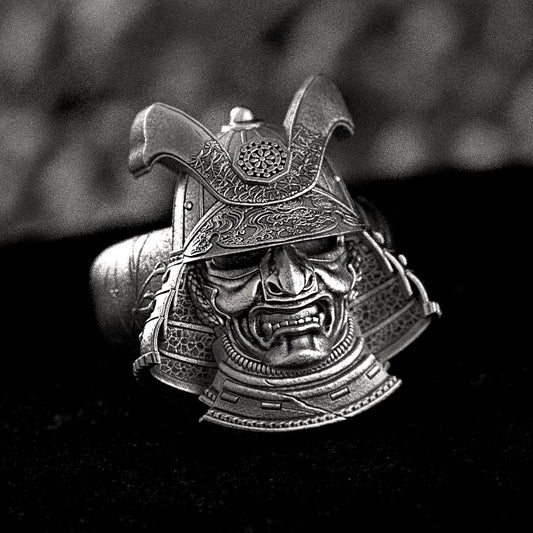 Front view of detailed samurai helmet ring with kabuto armor design.