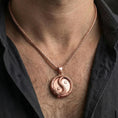 Load image into Gallery viewer, Rose gold plated yin yang dragon necklace worn on model as mythic spiritual jewelry