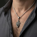 Load image into Gallery viewer, Oxidized dragon shield pendant necklace worn on male model as medieval fantasy jewelry