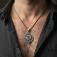 Load image into Gallery viewer, Oxidized yin yang dragon necklace worn on male model showcasing fantasy dragon medallion style