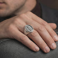 Load image into Gallery viewer, Oxidized sterling silver Our Lady of Guadalupe signet ring worn on male hand as religious jewelry