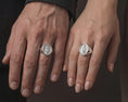 Load image into Gallery viewer, Polished silver Marian signet ring worn on hand showing devotional Catholic symbolism