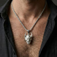 Load image into Gallery viewer, Polished silver Japanese demon oni necklace worn on chest highlighting warrior protection symbolism