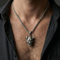 Load image into Gallery viewer, Oxidized oni mask pendant necklace worn on male model as a samurai spirit talisman