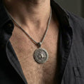 Load image into Gallery viewer, Oxidized Medusa pendant necklace worn on model as a powerful Greek mythology talisman