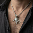 Load image into Gallery viewer, Polished silver Hand of Maliketh gamer necklace worn on chest emphasizing claw detail and gothic styling