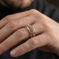 Load image into Gallery viewer, Rose gold plated Greek crowd relief wedding band ring worn on hand with refined classical styling and elevated artisan finish