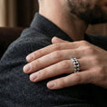 Load image into Gallery viewer, Polished silver chain link ring worn on hand, focusing on the mechanical texture, comfort fit, and modern unisex styling