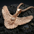 Load image into Gallery viewer, Rose gold plated owl jewelry pendant on volcanic rock, premium macro product photo, detailed owl feathers and bail