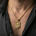 Load image into Gallery viewer, Gold plated Virgin Mary Baby Jesus necklace pendant worn on neck, close-up lifestyle shot, luxury lighting with refined metallic highlights
