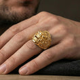 Load image into Gallery viewer, Balinese Barong god gold plated ring worn on finger, dramatic demon mask face design, masculine lifestyle close-up