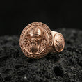 Load image into Gallery viewer, Odin the All-Father ring in a rose gold plated finish on volcanic rock, Norse pagan signet with Celtic knot frame, luxury studio close-up