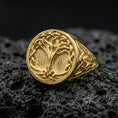 Load image into Gallery viewer, Celtic Yggdrasil ring in a gold plated finish on volcanic rock, Norse Tree of Life symbol with knotwork shoulders, premium macro product image
