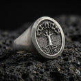 Load image into Gallery viewer, Sterling silver Tree of Life signet ring in oxidized finish on volcanic rock, Yggdrasil world tree, macro close-up